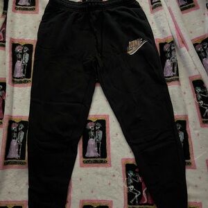 Nike Kids Black Sweatpants with Metallic Logo